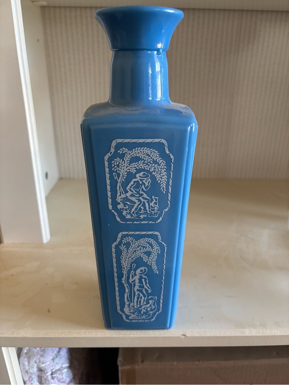 Blue Decorative Ceramic Vase with White Relief Scenes